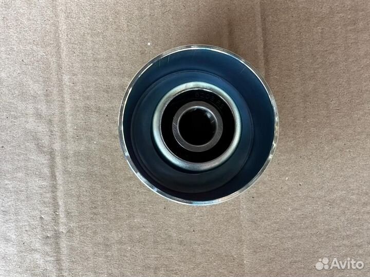 Ролик натяжителя ремня приводного Nissan Cabstar F