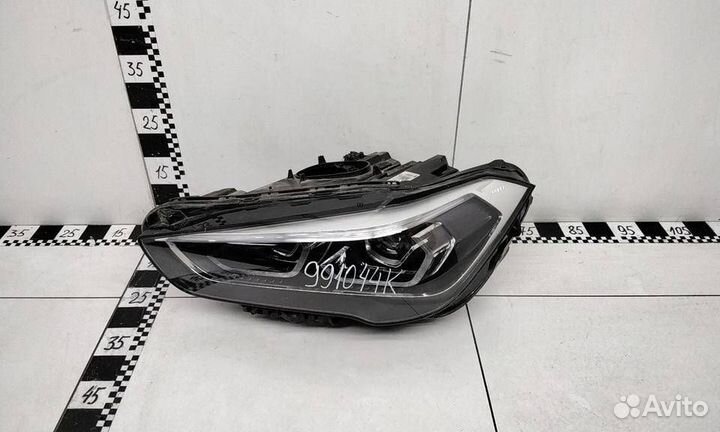 Фара левая BMW X1