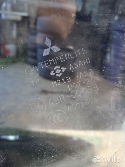 Стекло двери передней правой Mitsubishi Lancer