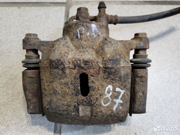 Суппорт передний левый Geely mk