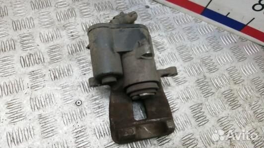 Суппорт тормозной задний левый volkswagen passat B