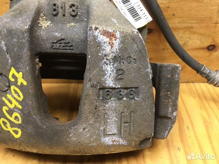 Суппорт передний левый Mazda Axela BK5P zyve 2006