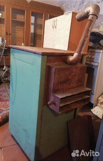 Отопительный котёл на газу и твердом топливе