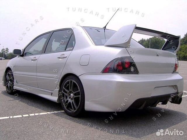 Evo ts. Лансер 9 цедия. Mitsubishi Lancer Cedia обвес EVO. Lancer Cedia body Kit. Mitsubishi Cedia обвес EVO.