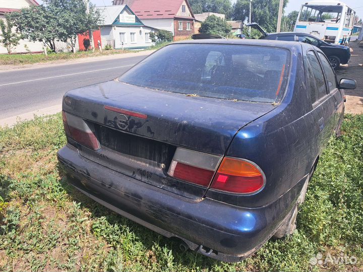 Дверь Nissan almera n15