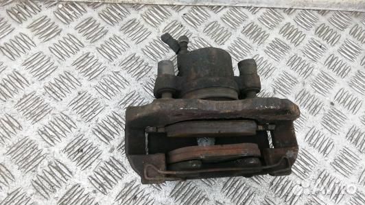 Суппорт тормозной передний левый ford focus 2 (8LV