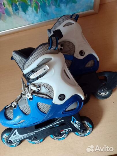 Роликовые коньки