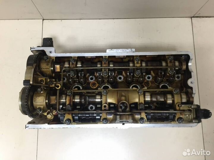 Б/У Головка блока цилиндров 11121556428 BMW