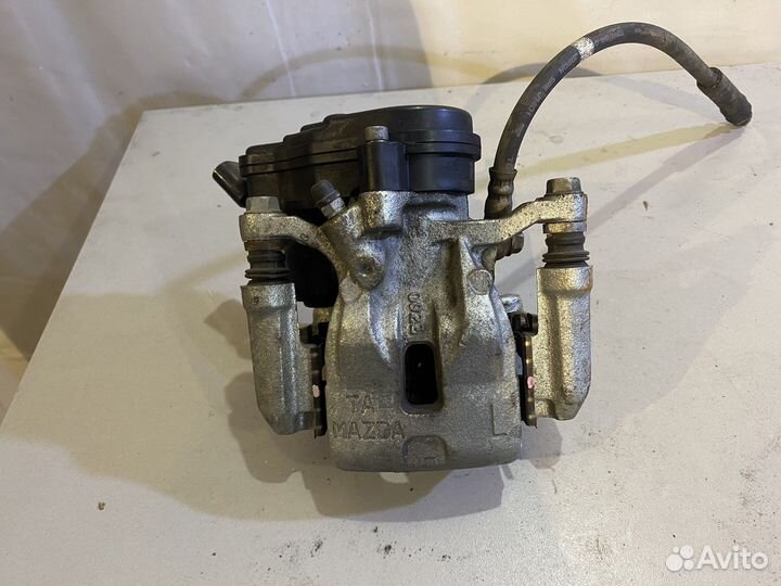 Тормозной суппорт задний левый mazda cx5 kf