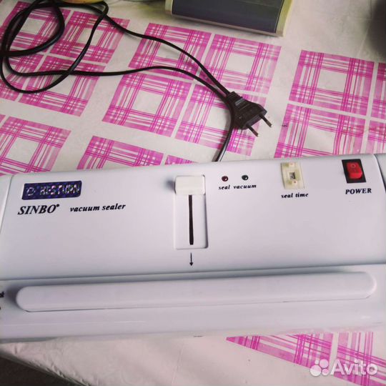 Вакуумный упаковщик