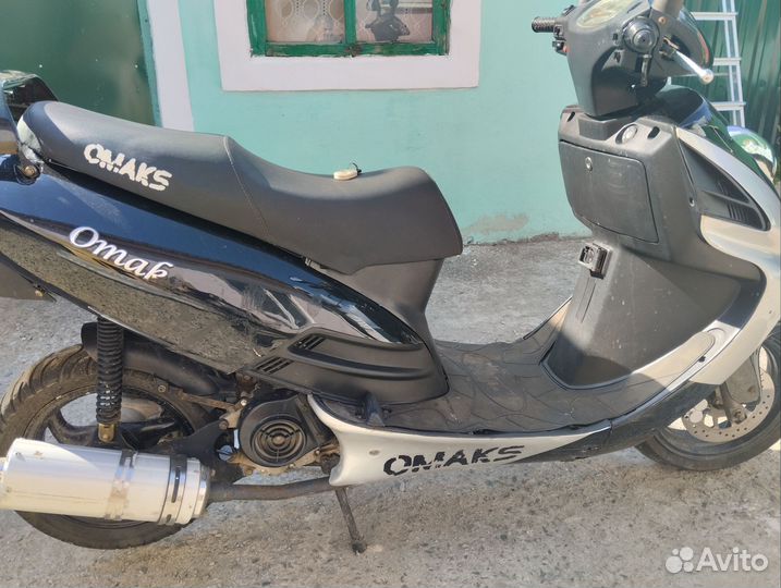 Скутер Omaks