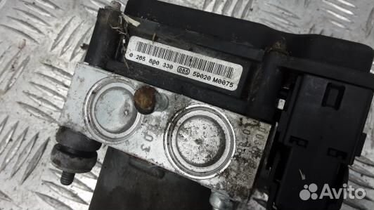 Блок ABS nissan almera N16 (SML20KW01)