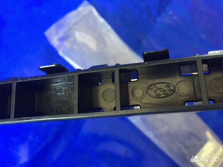 Кронштейн переднего бамп прав Subaru Impreza G12