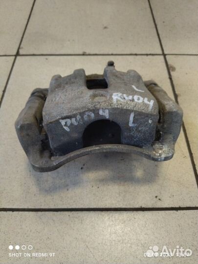 Суппорт тормозной передний левый Kia Rio 4