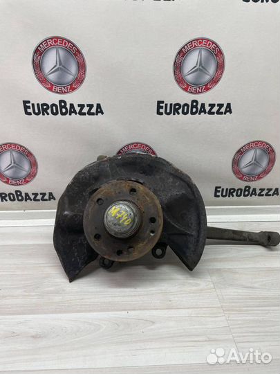 Кулак поворотный левый Mercedes W208