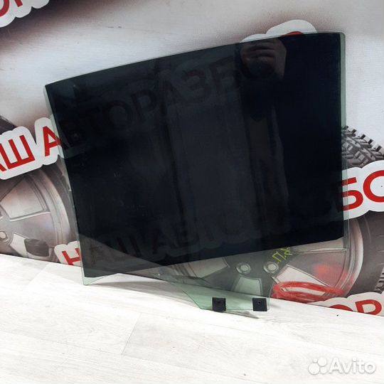 Стекло двери заднее правое Renault Logan седан