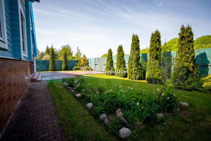 Коттедж 318,4 м² на участке 9 сот.