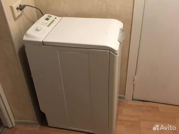 Стиральная машина с вертикальной загрузкой