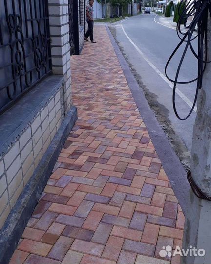 Укладка тротуарной плитки брусчатка