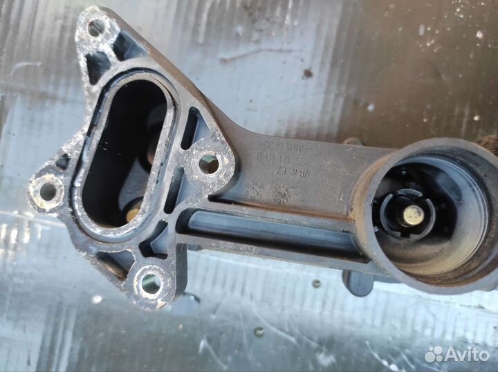 Корпус термостата skoda 1.2 03C121111B