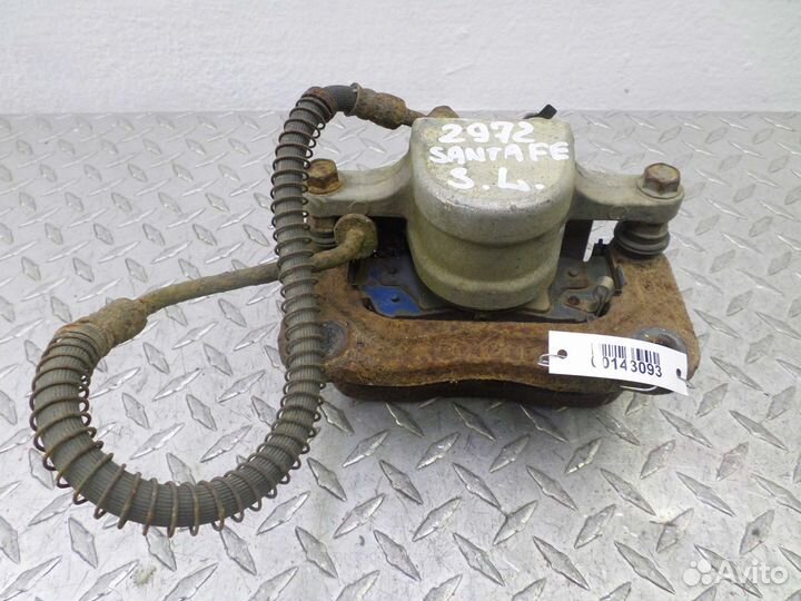 Суппорт задний левый Hyundai Santa Fe 2 CM