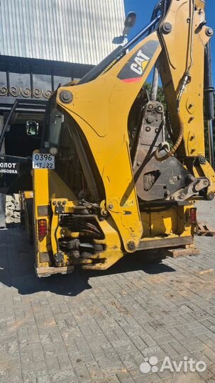 Услуги экскаватора-погрузчика Caterpillar