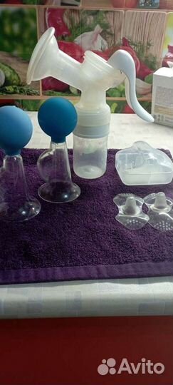 Молокоотсос и накладки на грудь