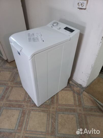 Стиральная машина с вертикальной загрузкой