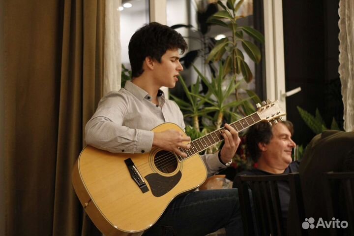 Репетитор по игре на гитаре