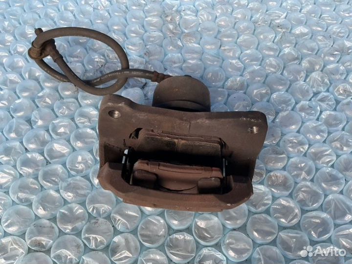 Суппорт передний левый Toyota Celica T230 1zzfe