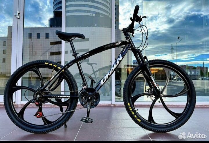 Велосипед на литых дисках новый
