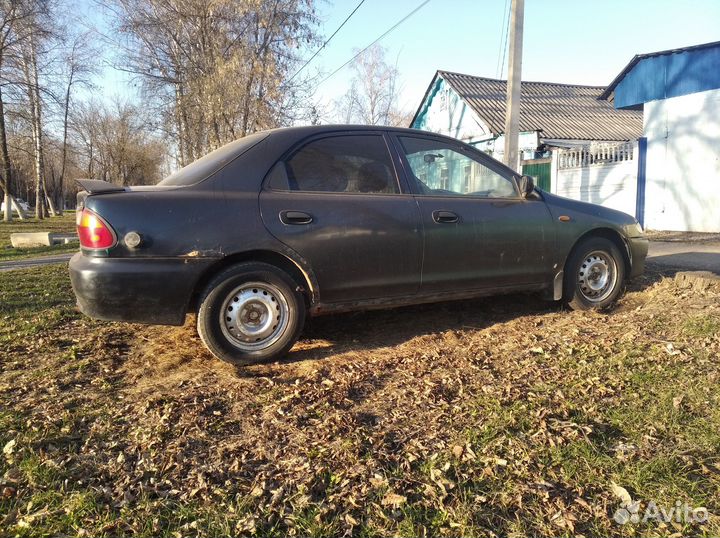 Mazda 323 1.5 МТ, 1995, 366 855 км