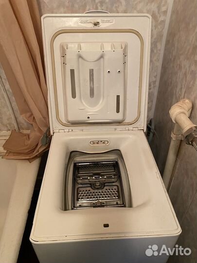 Стиральная машина с вертикальной загрузкой