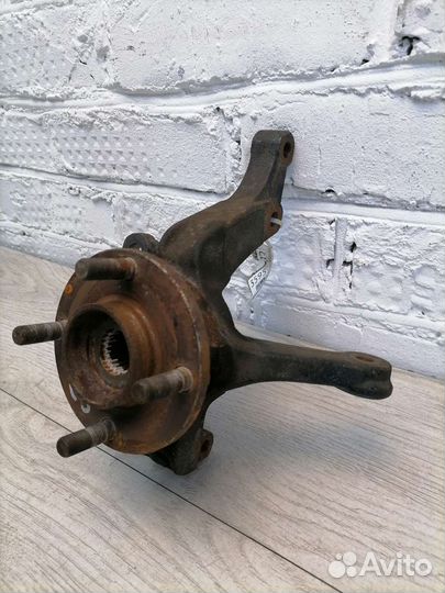 Кулак поворотный передний левый Nissan Micra K12