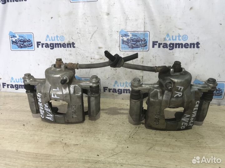 Суппорт тормозной передний Chevrolet Aveo