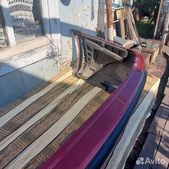 Задний бампер Mitsubishi carisma 2002 г