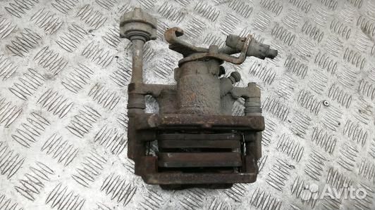 Суппорт тормозной задний левый opel astra J (LDN31