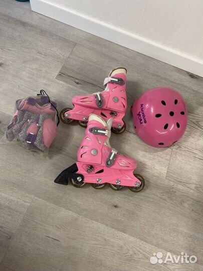 Роликовые коньки