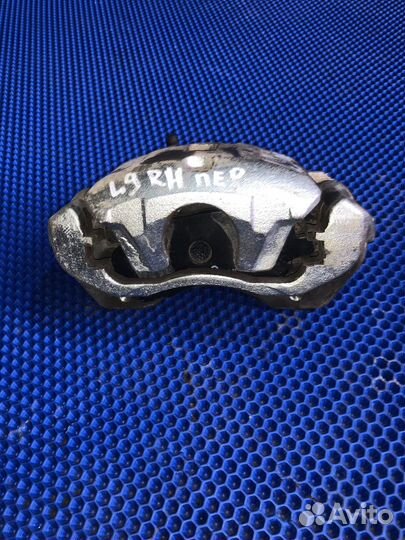 Суппорт передний правый mitsubishi lancer 9