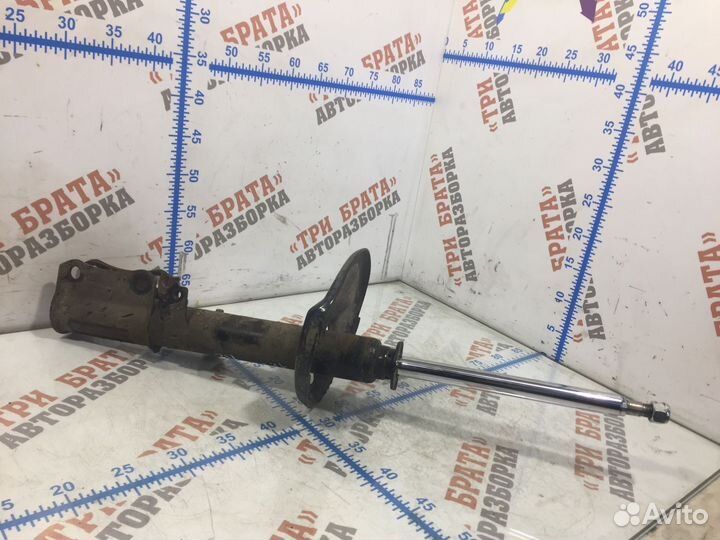 Тойота Камри Амортизатор задний Прав