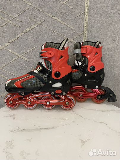 Роликовые коньки