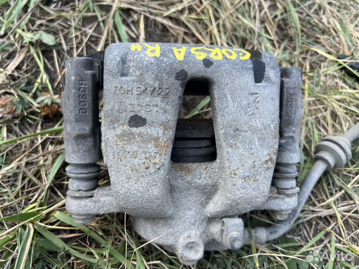 Тормозной суппорт передний Opel Corsa D