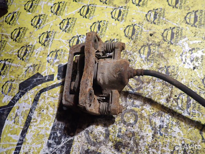 Суппорт тормозной задний левый Hyundai Sonata 4