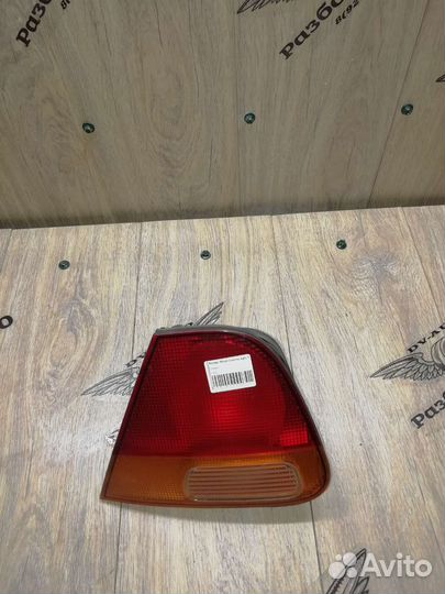 Фонарь задний mitsubishi carisma 4g62