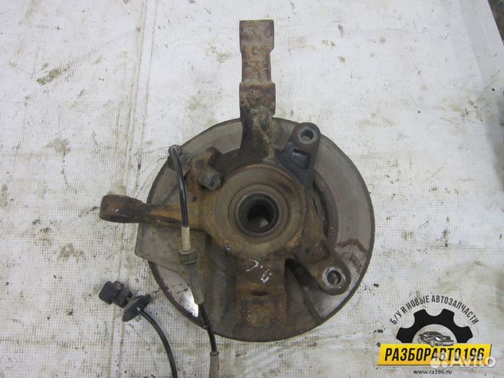 Кулак поворотный передний левый Chevrolet Aveo (T2