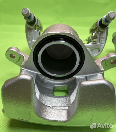 Nissan Tiida LADA Vesta Largus тормозной суппорт