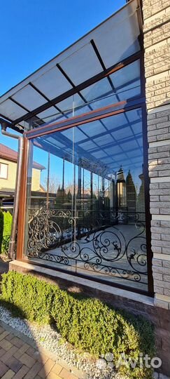 Безрамное раздвижное остекление