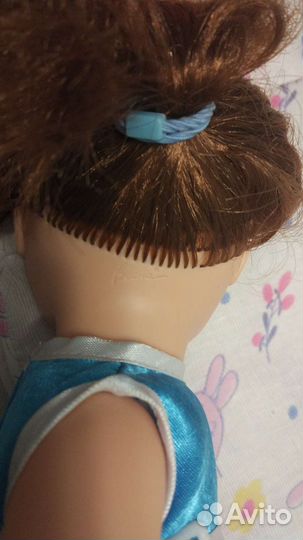 Кукла и кровать