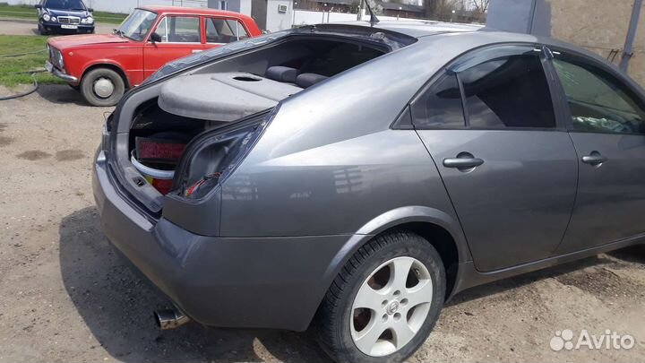 Задняя часть nissan primera P12 лифтбек