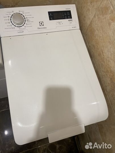 Стиральная машина с вертикальной загрузкой